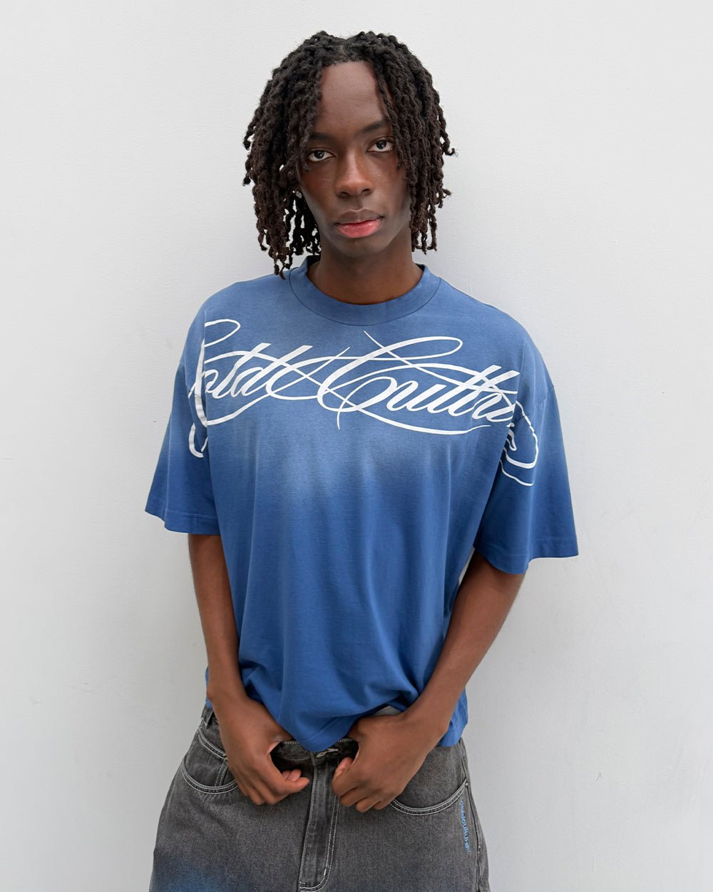 CROSSED SCRIPT TEE BLUE - washed blue tee, front view on male model - Cold Culture #man