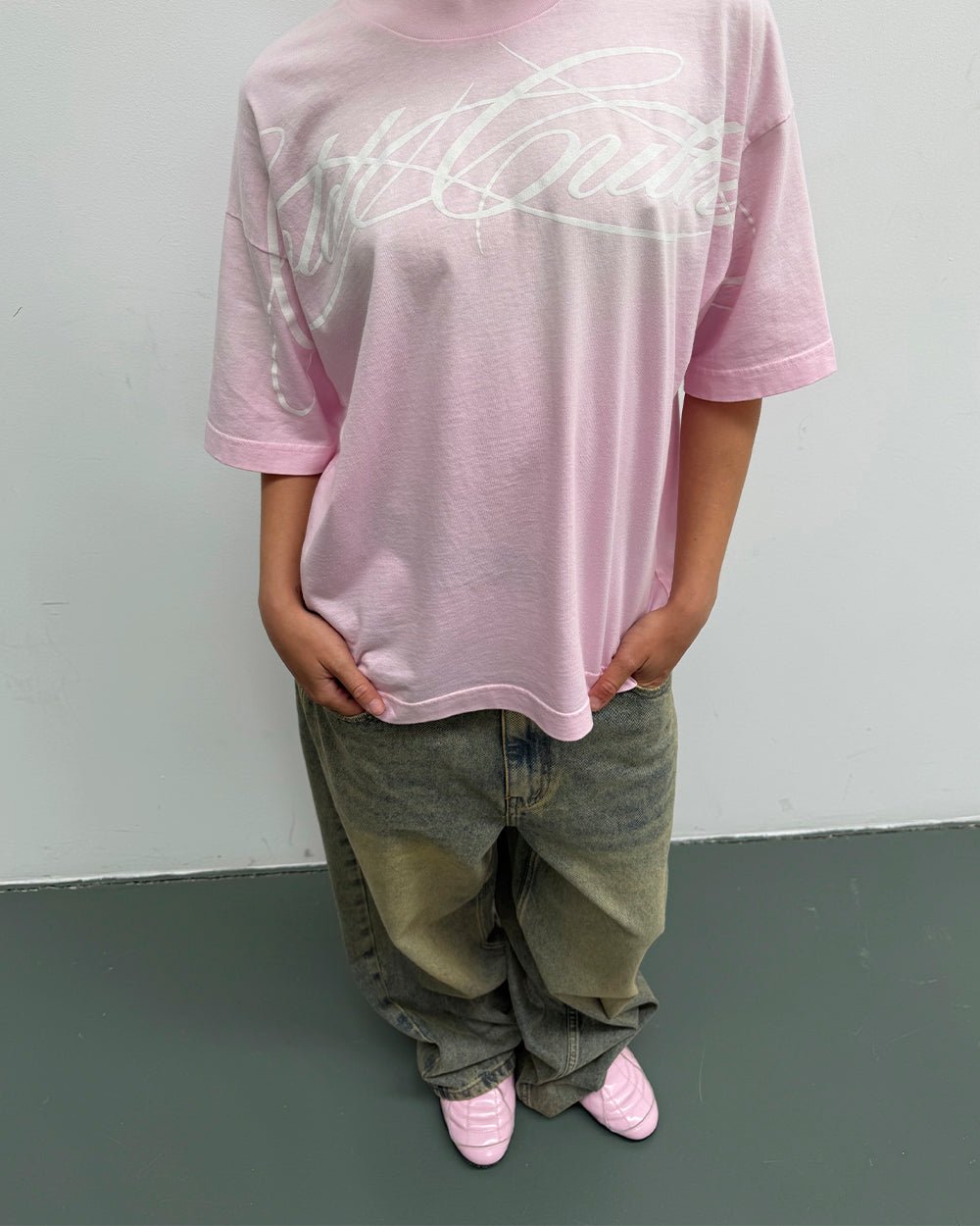 CROSSED SCRIPT TEE PINK - washed pink tee, on model close-up - Cold Culture