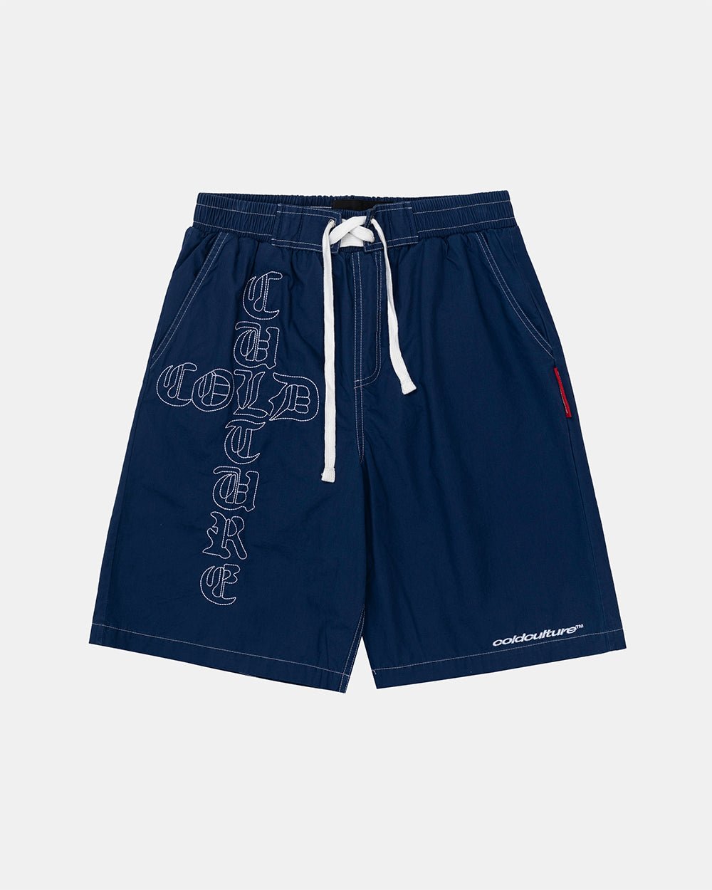 CROSSED SWIMSHORTS BLUE - navy gothic print swim shorts, front view - Cold Culture #packshot