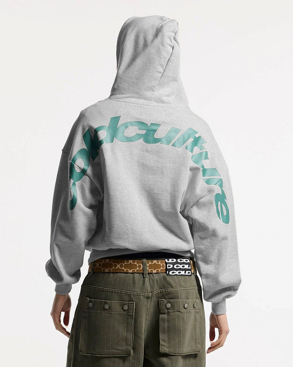 CURVED HOODIE ASH GREY - grey oversized hoodie, back view on female model - Cold Culture #woman