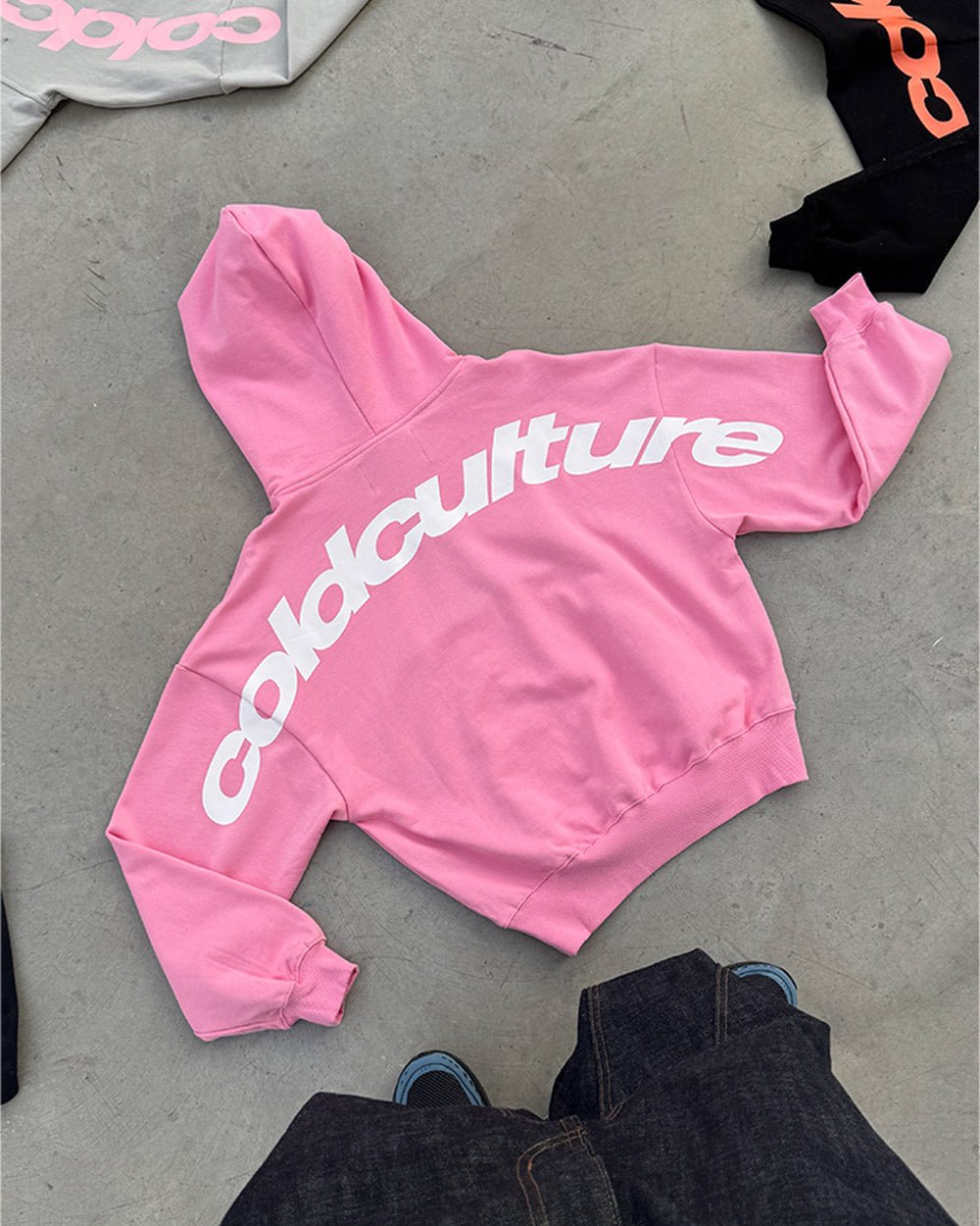 CURVED HOODIE PINK - pink oversized hoodie, flat lay - Cold Culture