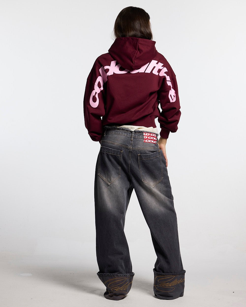 CURVED HOODIE WINE RED - wine red oversized hoodie, back view on female model - Cold Culture #woman