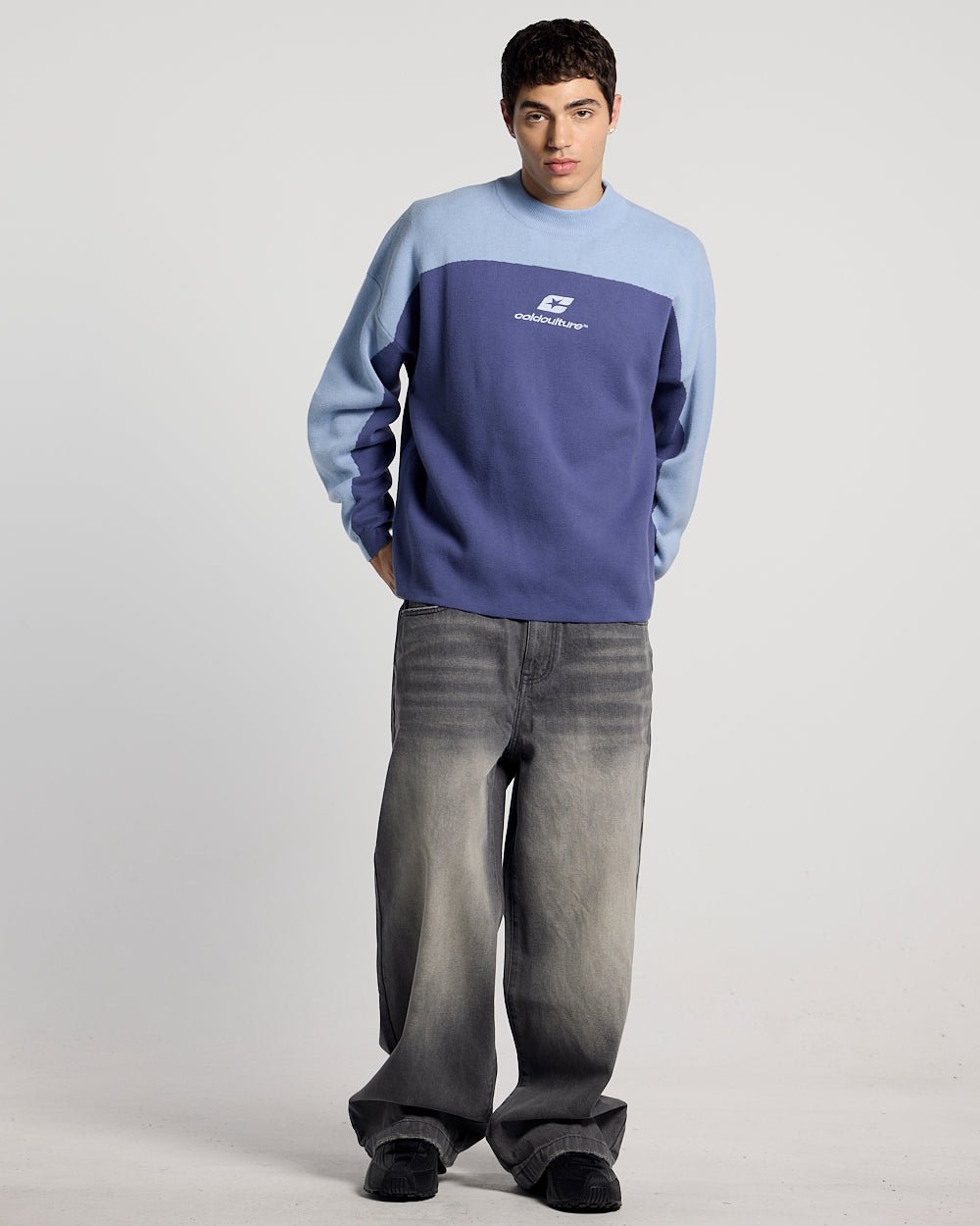 CURVED KNIT BLUE - blue two-tone knit sweater, front view on male model - Cold Culture #man
