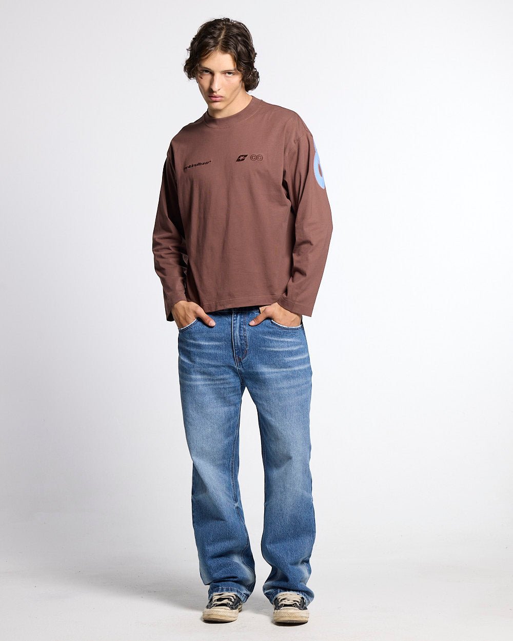 CURVED KNOTS LONGSLEEVE BROWN - brown logo print longsleeve tee, front view on male model - Cold Culture #man