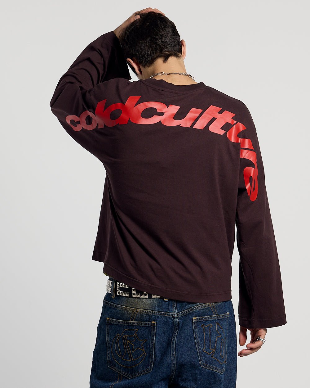 CURVED LONGSLEEVE BROWN - brown oversized longsleeve tee, back view on male model - Cold Culture #man