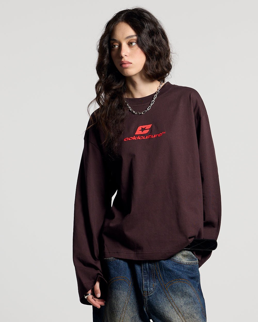 CURVED LONGSLEEVE BROWN - brown oversized longsleeve tee, front view on female model - Cold Culture #woman