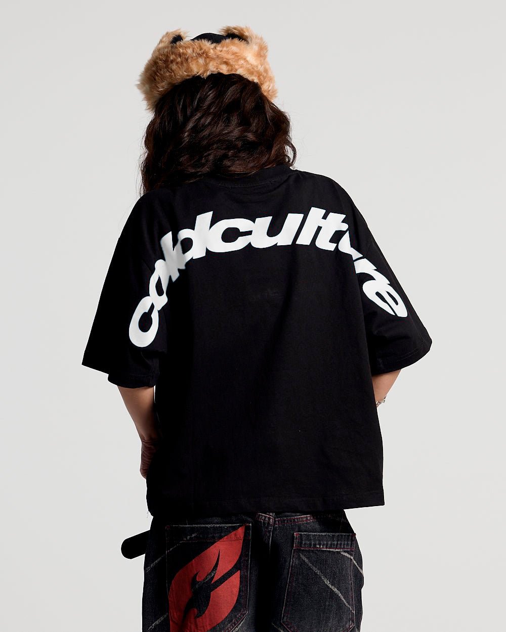 CURVED TEE BLACK & WHITE - black graphic print tee, back view on female model - Cold Culture #woman