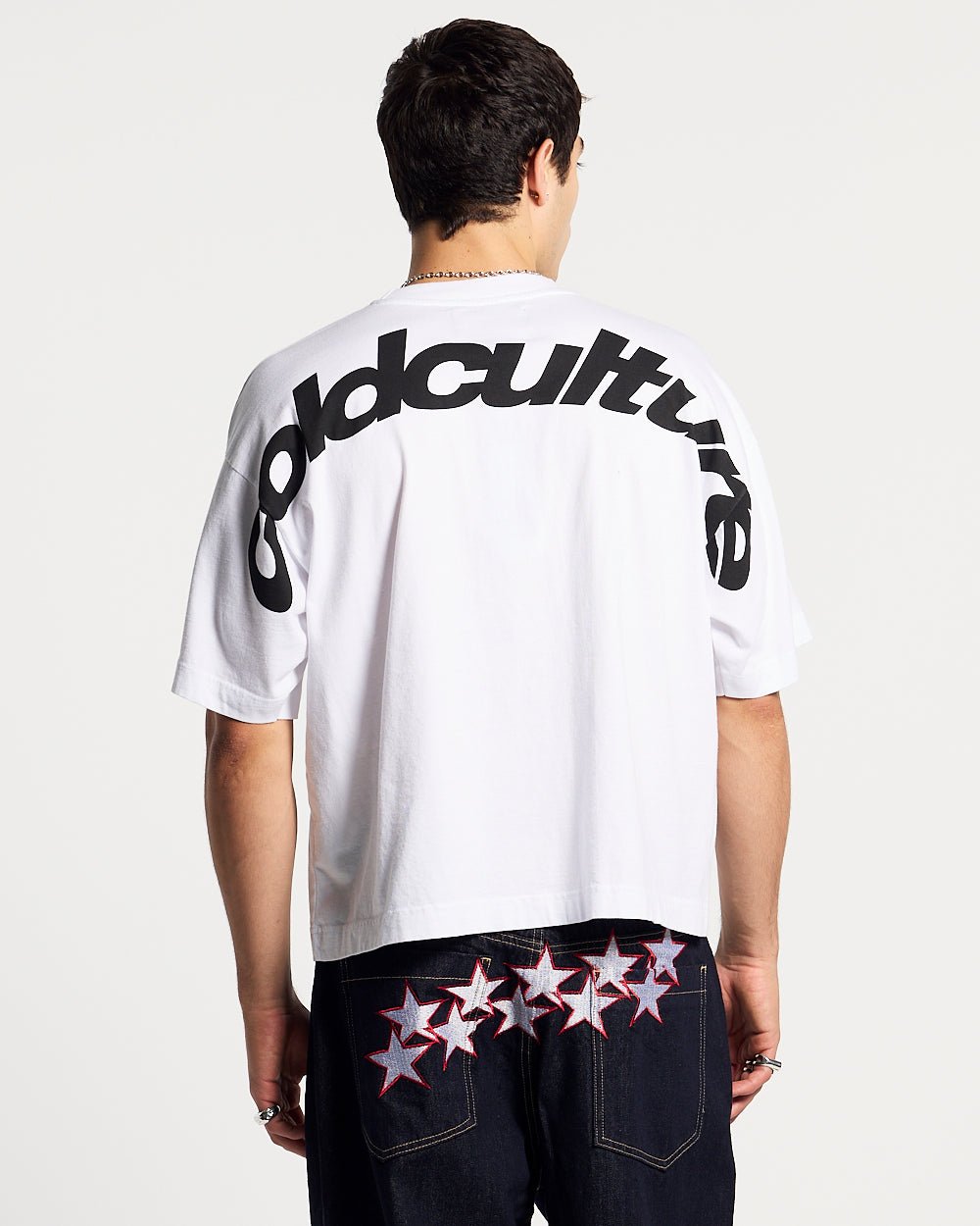 CURVED TEE WHITE - white oversized tee, back view on male model - Cold Culture #man