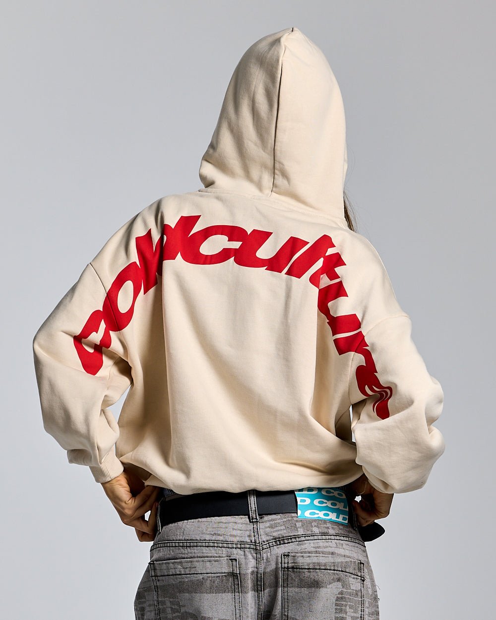 CURVED ZIP HOODIE CREAM - cream logo print zip hoodie, back view on female model - Cold Culture #woman