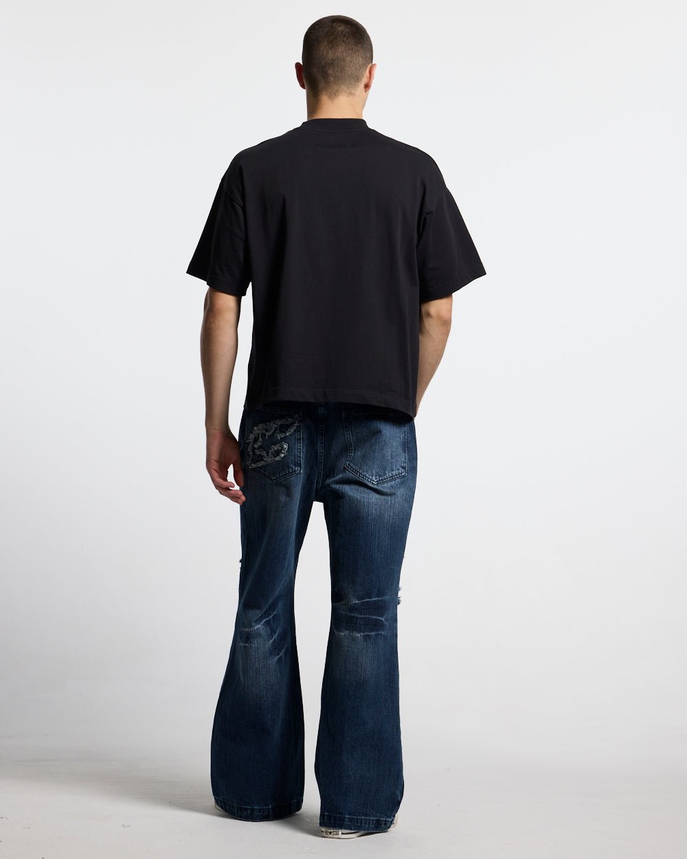 D-STRESSED V3 PANTS WASHED DENIM - distressed washed denim pants, back view on male model - Cold Culture #man