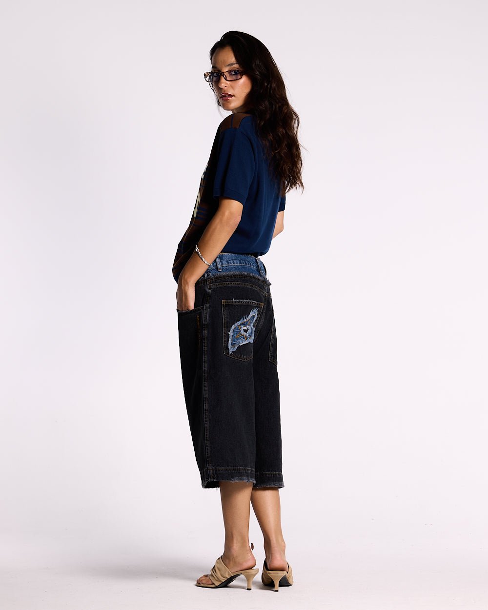 DARK SEA SHORT - baggy black denim shorts, side view - Cold Culture #woman