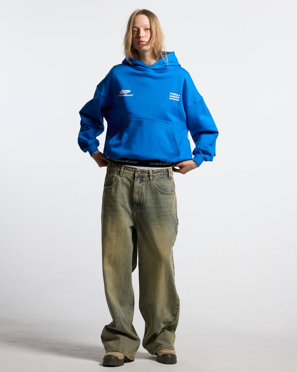 DEFENSE HOODIE ELECTRIC BLUE - royal blue graphic print hoodie, front view on female model - Cold Culture #woman