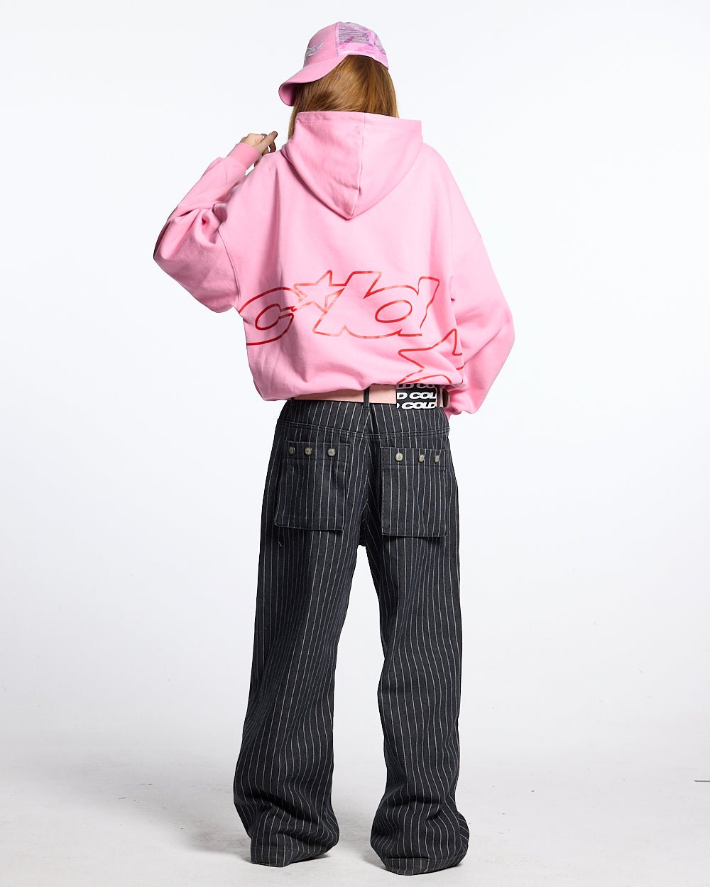 DEFENSE HOODIE PINK AND RED - pink oversized hoodie, back view on female model - Cold Culture #woman