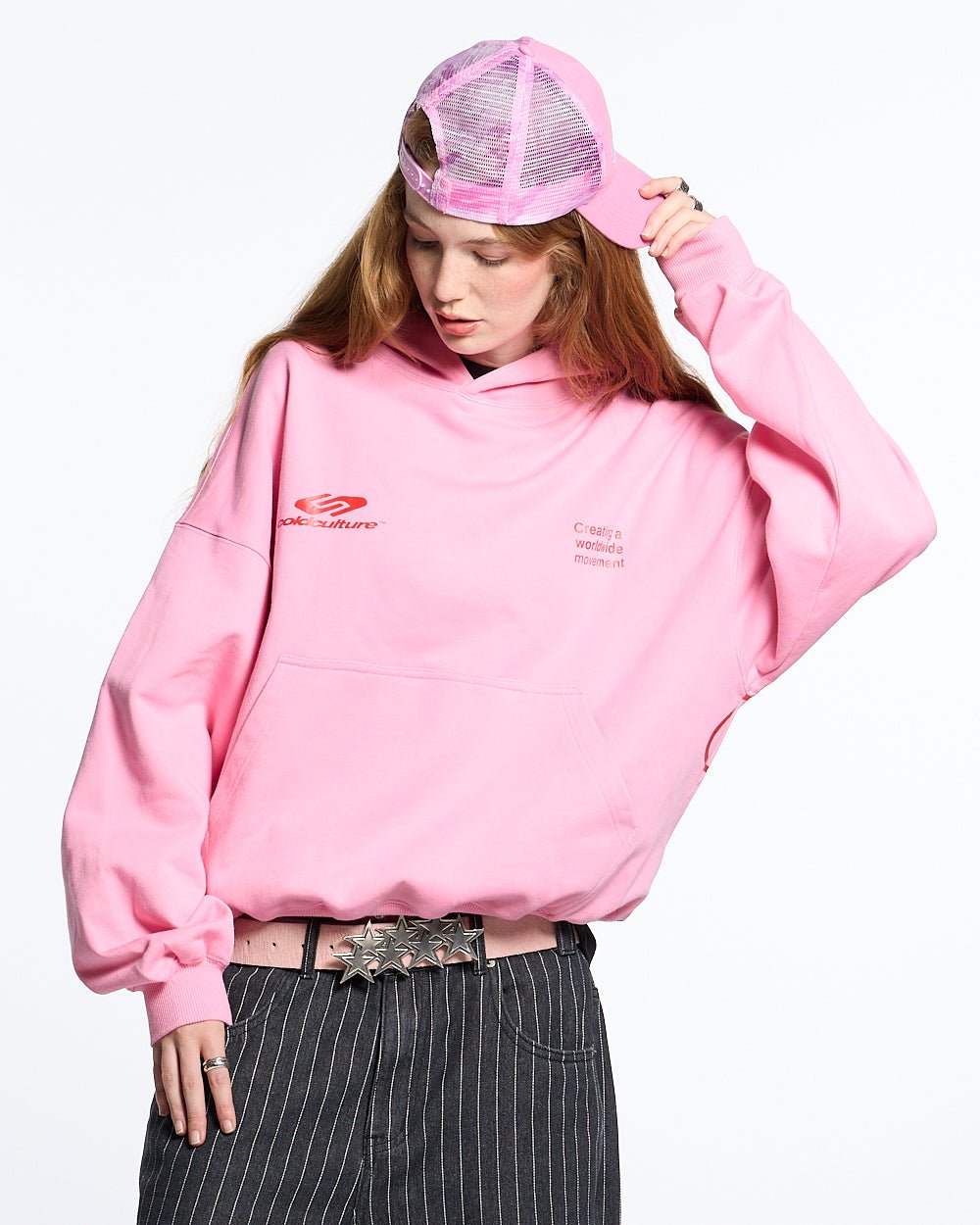 DEFENSE HOODIE PINK AND RED - pink oversized hoodie, front view on female model - Cold Culture #woman