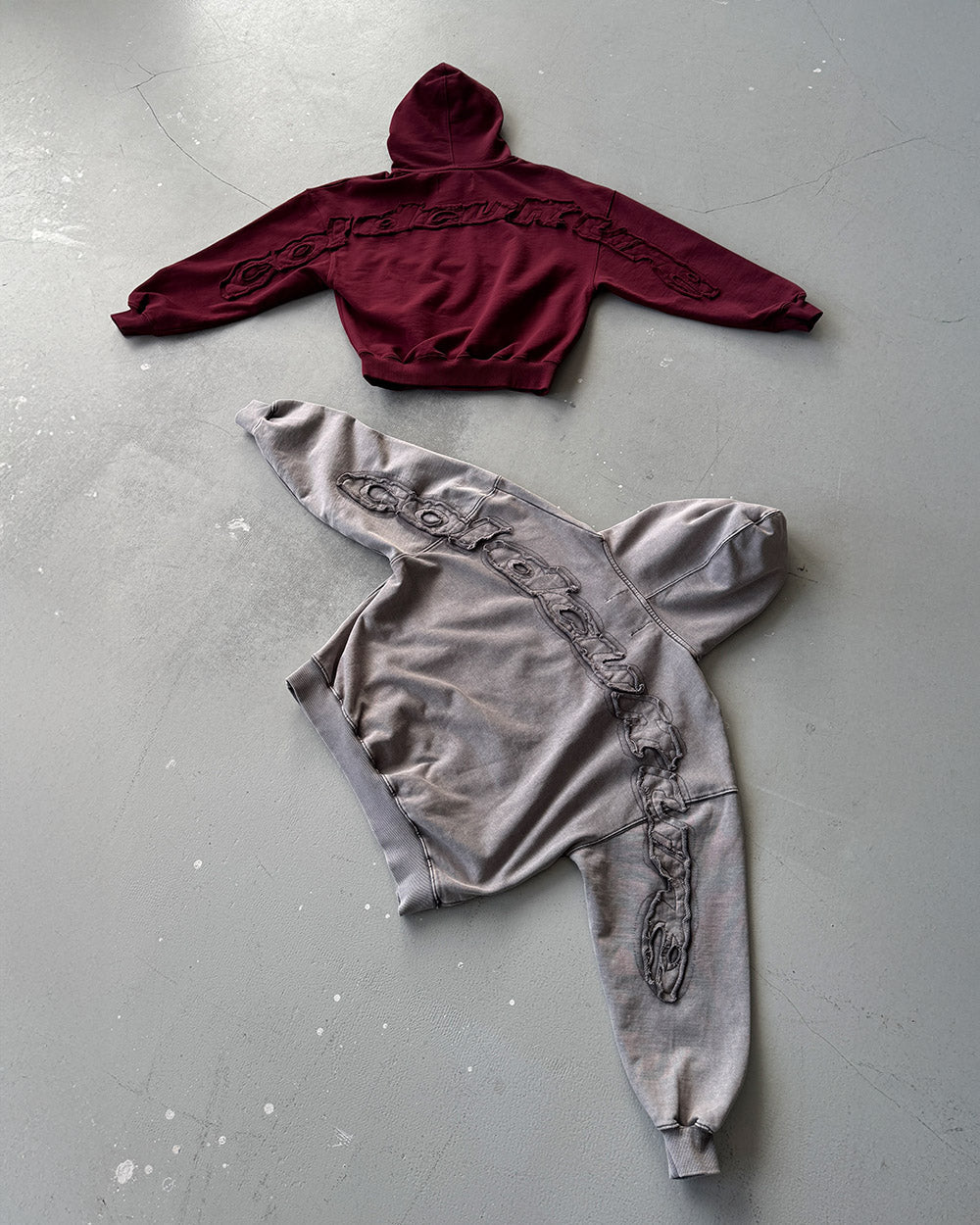 DISTRESS CURVED HOODIE BURGUNDY - burgundy distressed hoodie, flat lay with matching pieces - Cold Culture
