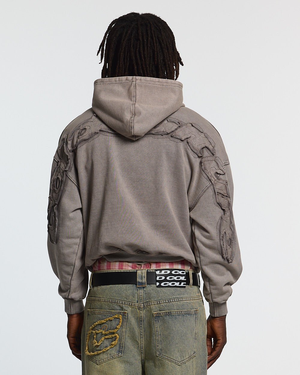 DISTRESS CURVED HOODIE WASHED GREY - washed grey distressed hoodie, back view on male model - Cold Culture #man