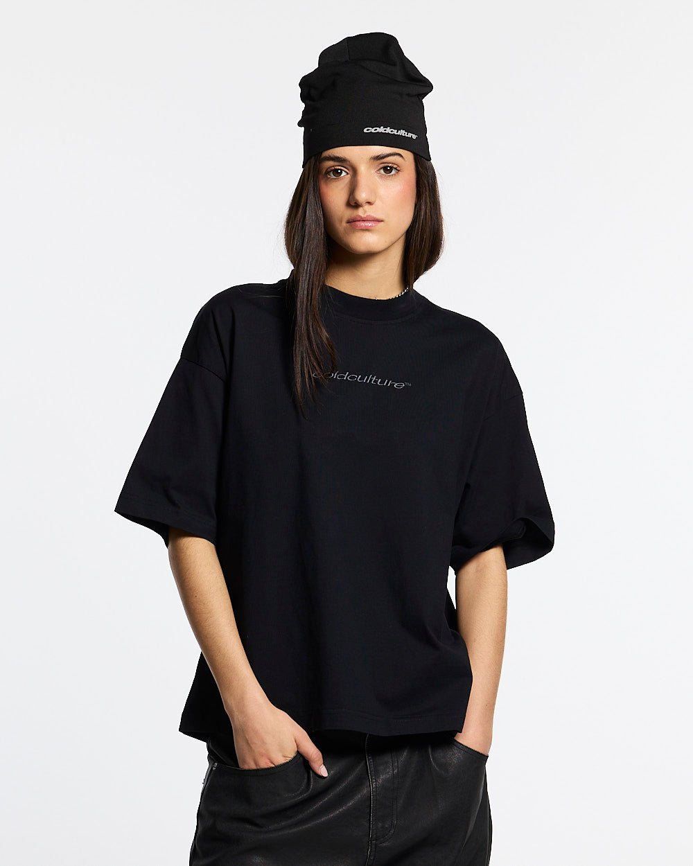 DISTRESS CURVED TEE BLACK - black distressed tee, front view on female model - Cold Culture #woman