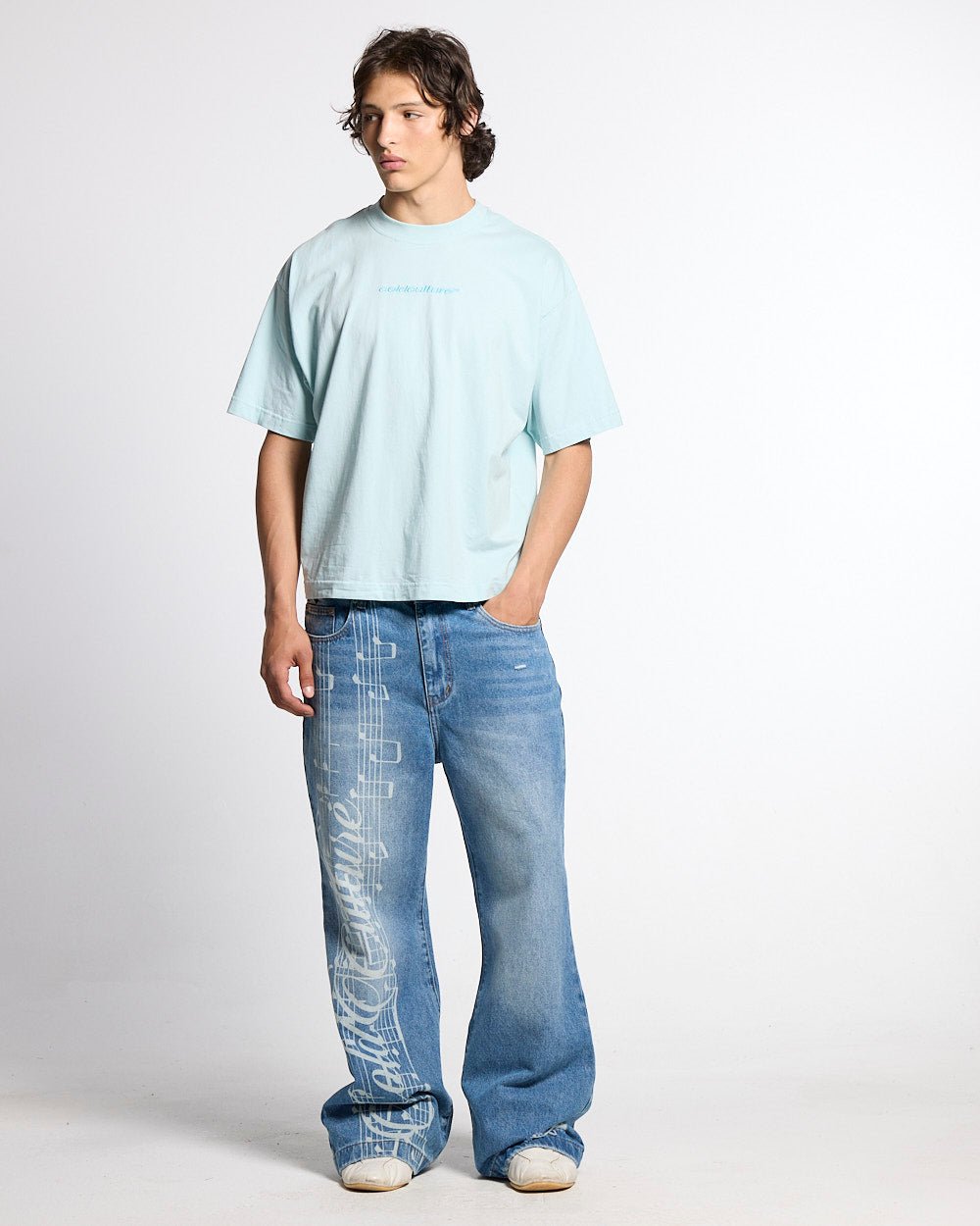 DISTRESS CURVED TEE BLUE - light blue distressed logo tee, front view on male model - Cold Culture #man