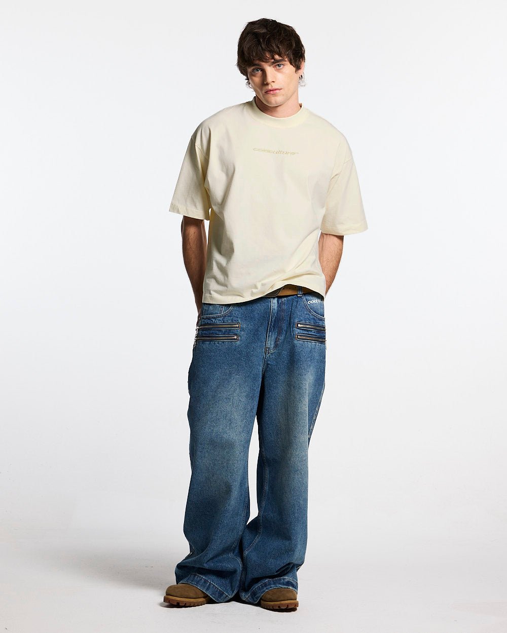 DISTRESS CURVED TEE CREAM - cream distressed tee, front view on male model - Cold Culture #man