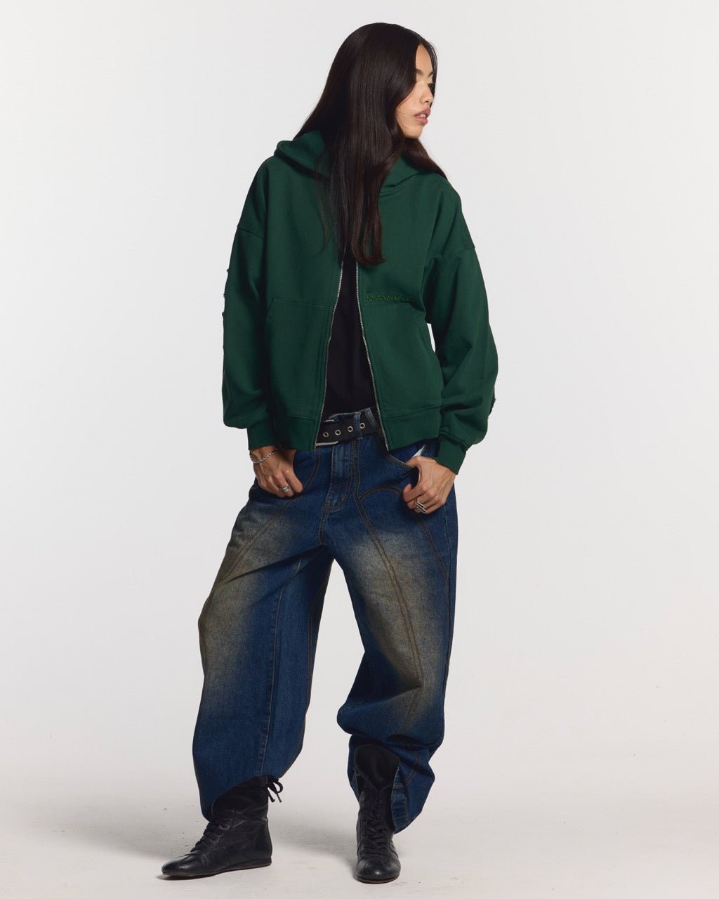 DISTRESS CURVED ZIP HOODIE GREEN - green distressed zip-up hoodie, front view on female model - Cold Culture #woman