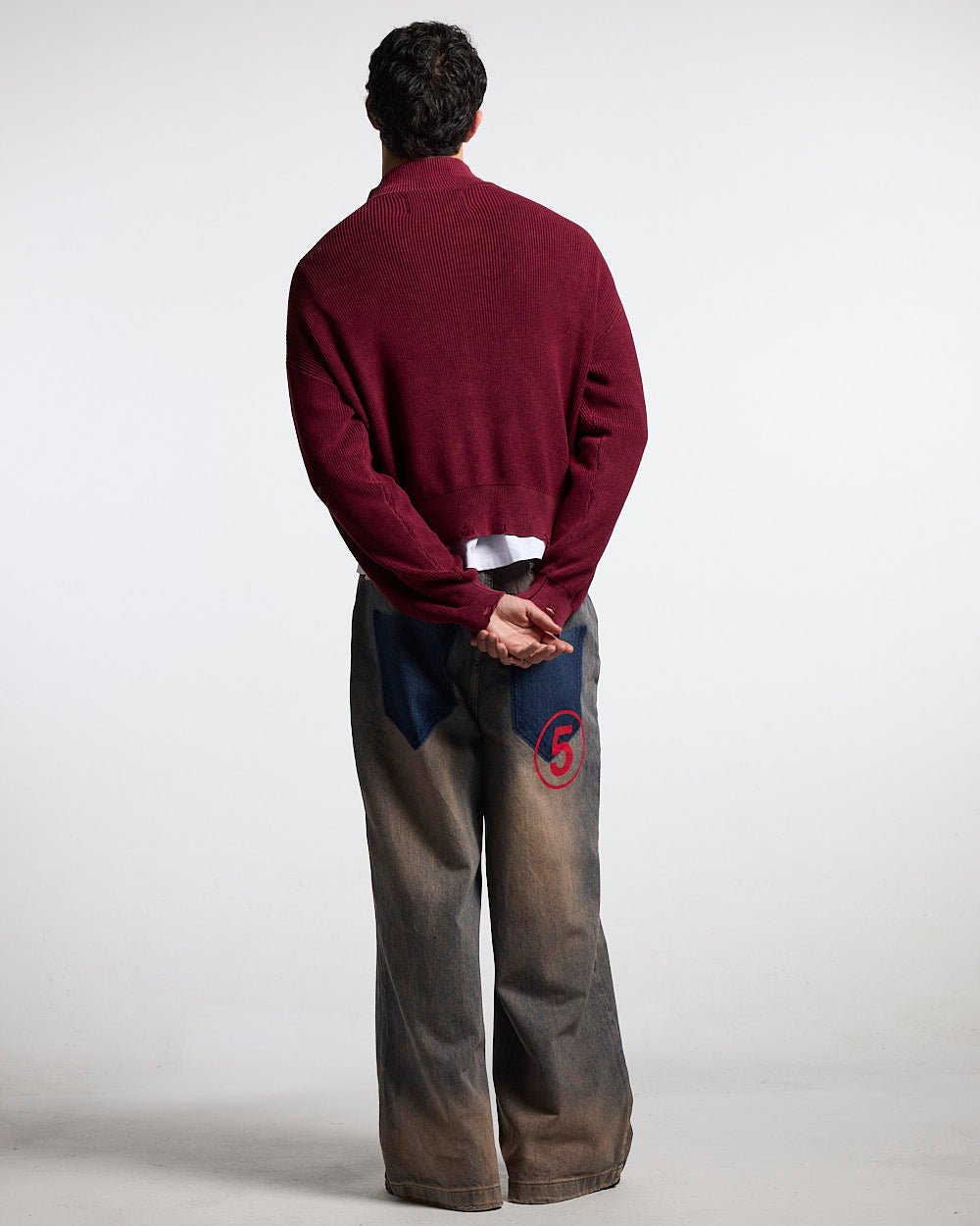DISTRESS CURVED ZIP KNIT BURGUNDY - burgundy washed zip knit sweater, back view on male model - Cold Culture #man