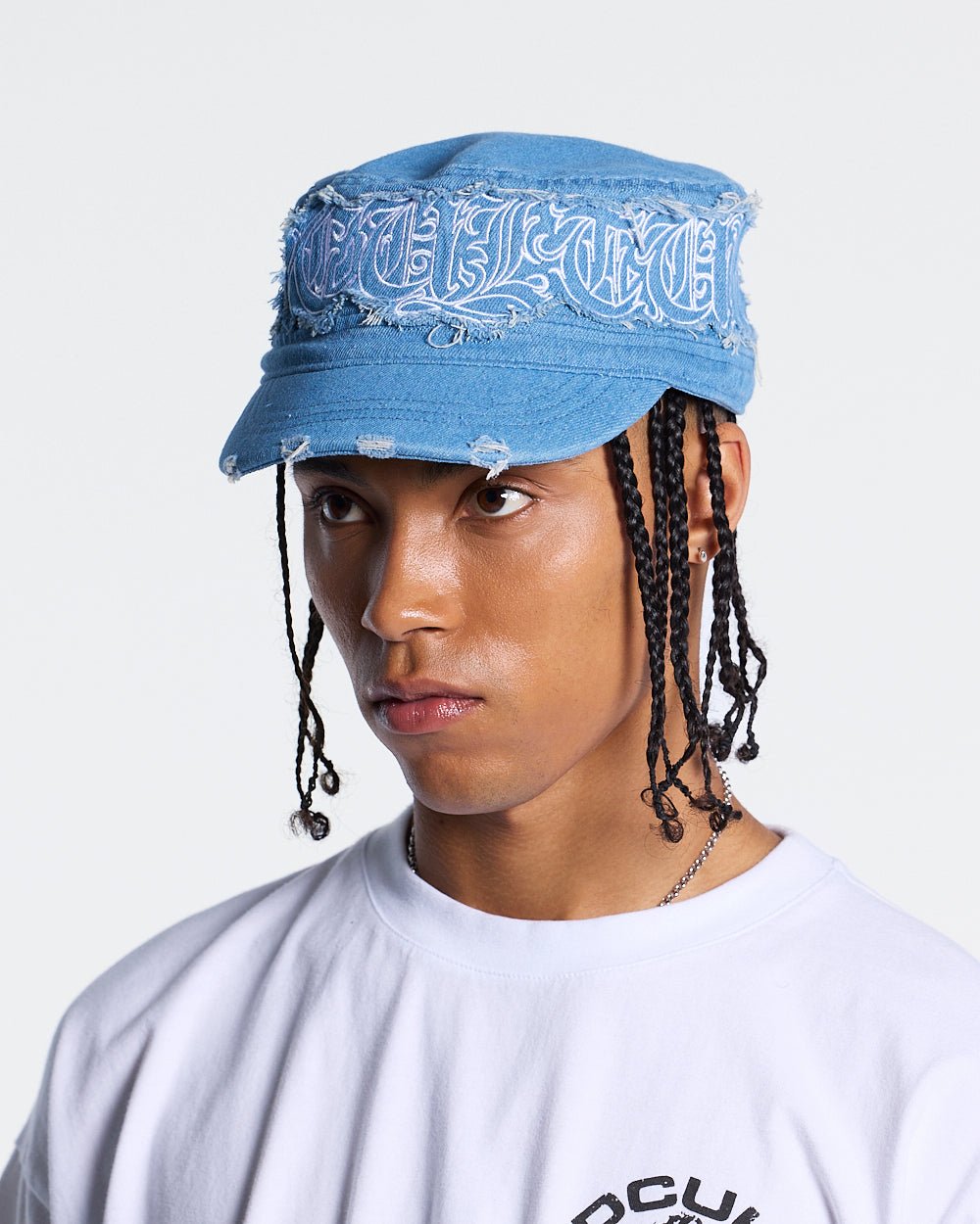 DISTRESS GOTHIC CAP DENIM - blue distressed denim cap, on model close-up - Cold Culture #man