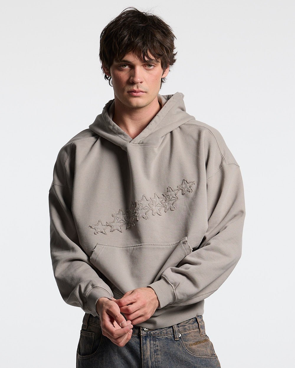 DISTRESS STARS HOODIE BEIGE - beige distressed hoodie, front view on male model - Cold Culture #man