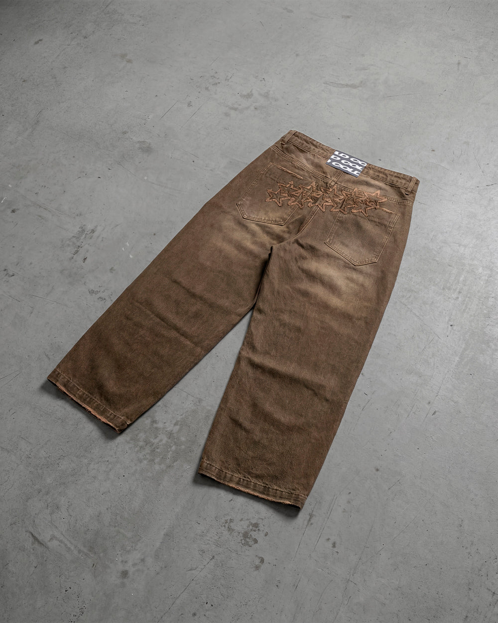 DISTRESS STARS V2 PANTS BROWN DENIM - brown washed denim pants, flat lay - Cold Culture