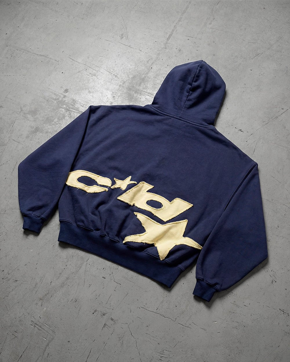 DISTRESSED DEFENSE HOODIE NAVY - navy distressed hoodie, flat lay - Cold Culture
