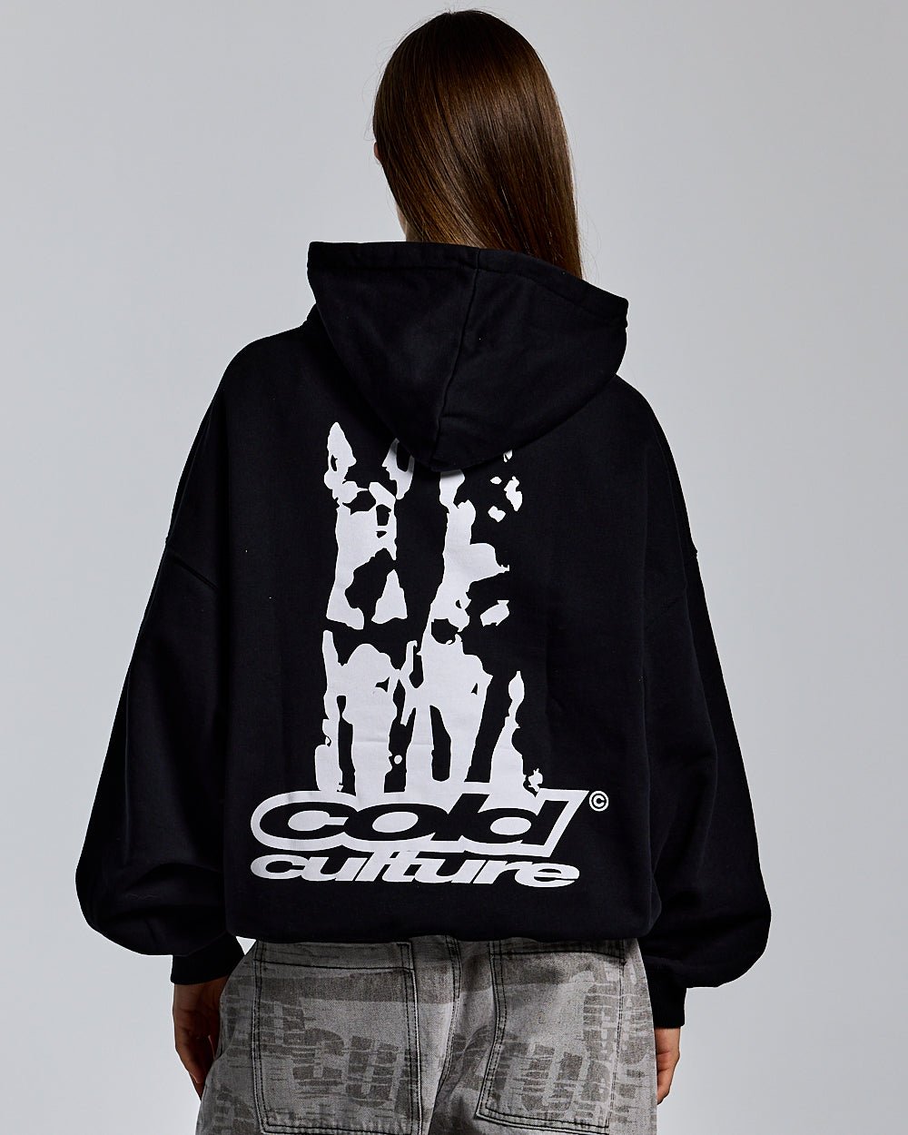 DOGS HOODIE BLACK - black graphic print hoodie, back view on female model - Cold Culture #woman