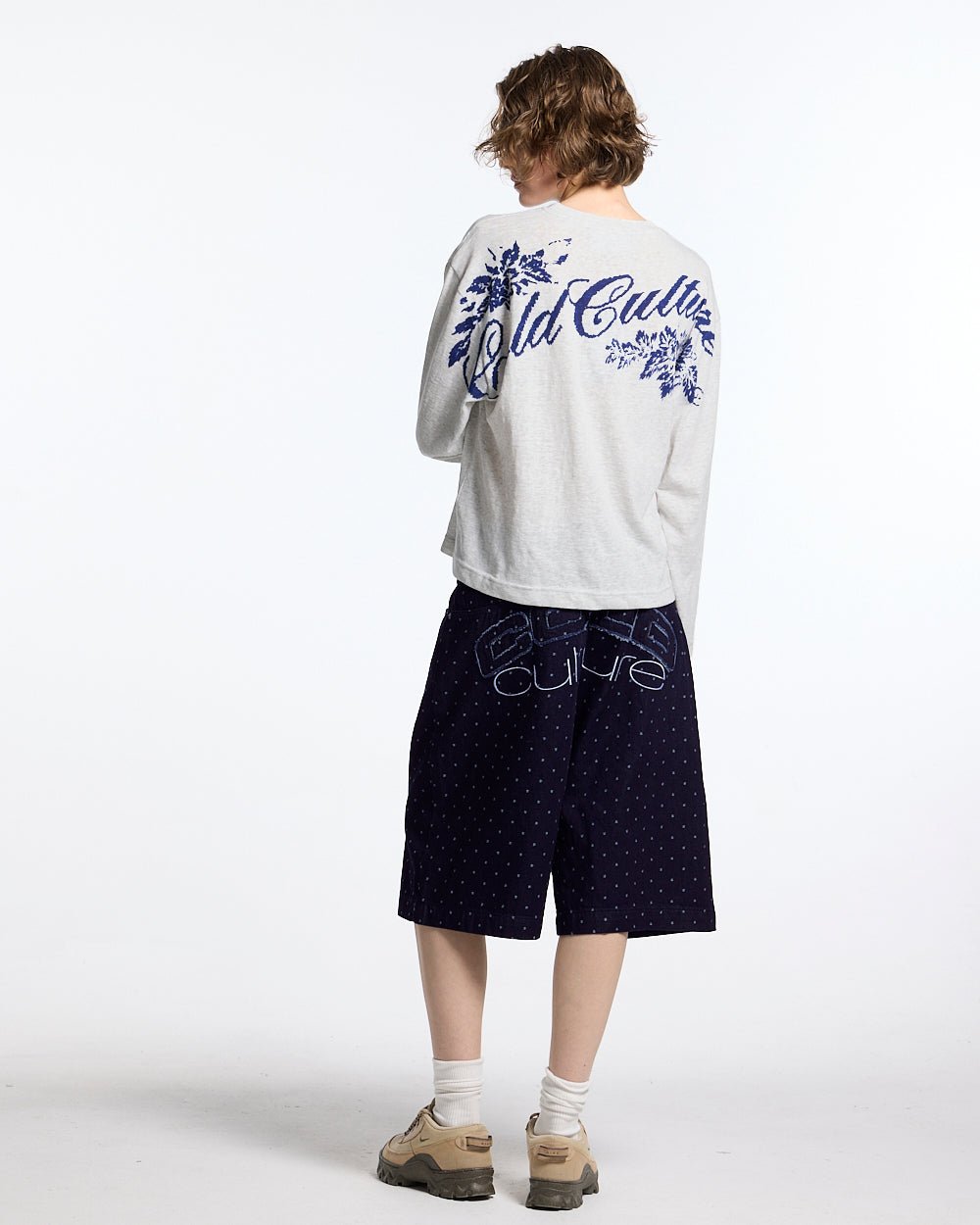 DOT CLUB SHORTS BLACK - black polka dot shorts, back view on female model - Cold Culture #woman