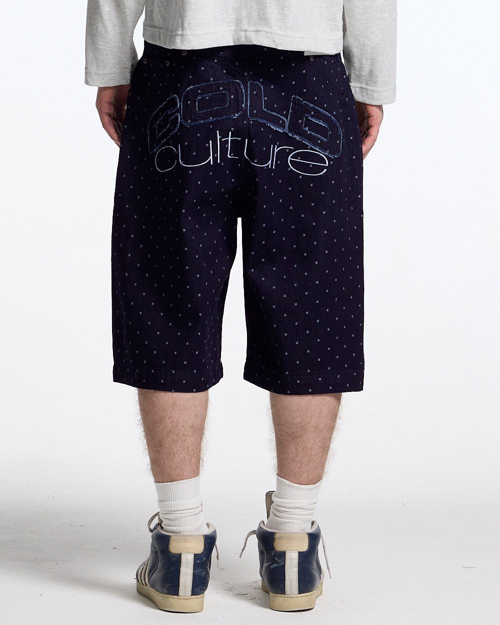 DOT CLUB SHORTS BLACK - black polka dot shorts, back view on male model - Cold Culture