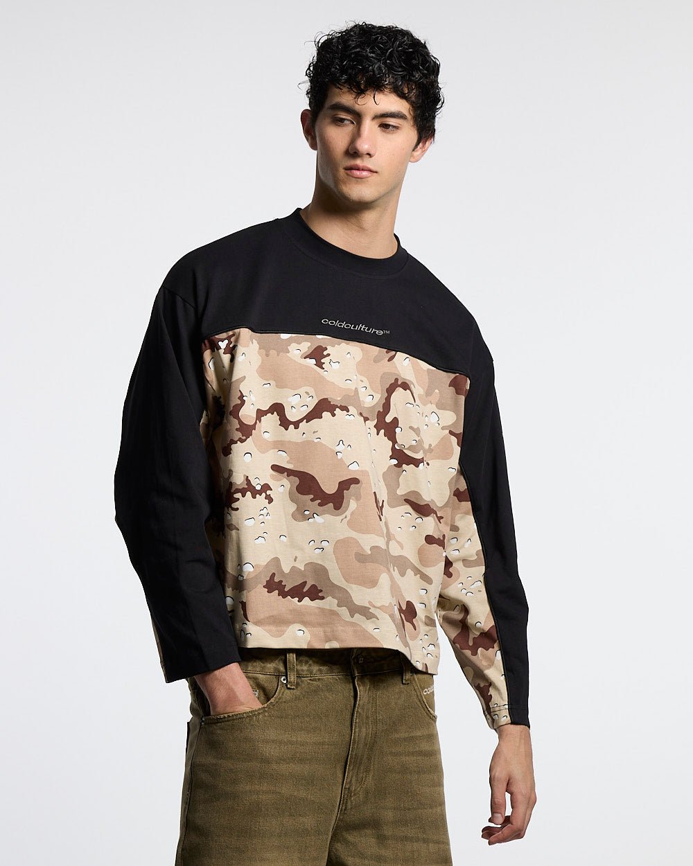 DOUBLE SIDED LONGSLEEVE CAMO - black and camo longsleeve tee, front view on male model - Cold Culture #man