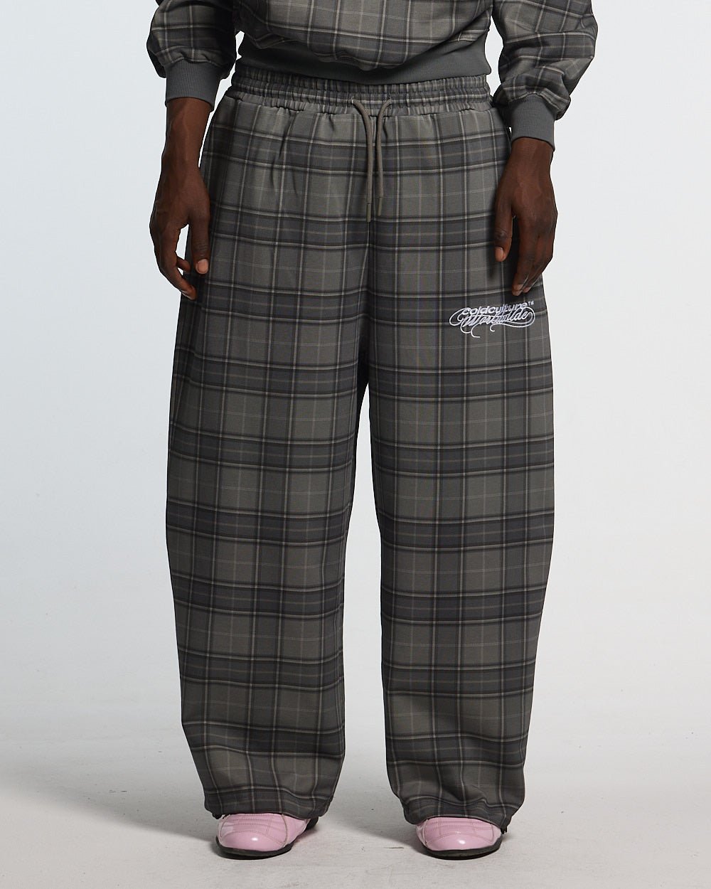 DRIFT SWEATPANTS GREY MIX - grey plaid sweatpants, front view on male model - Cold Culture