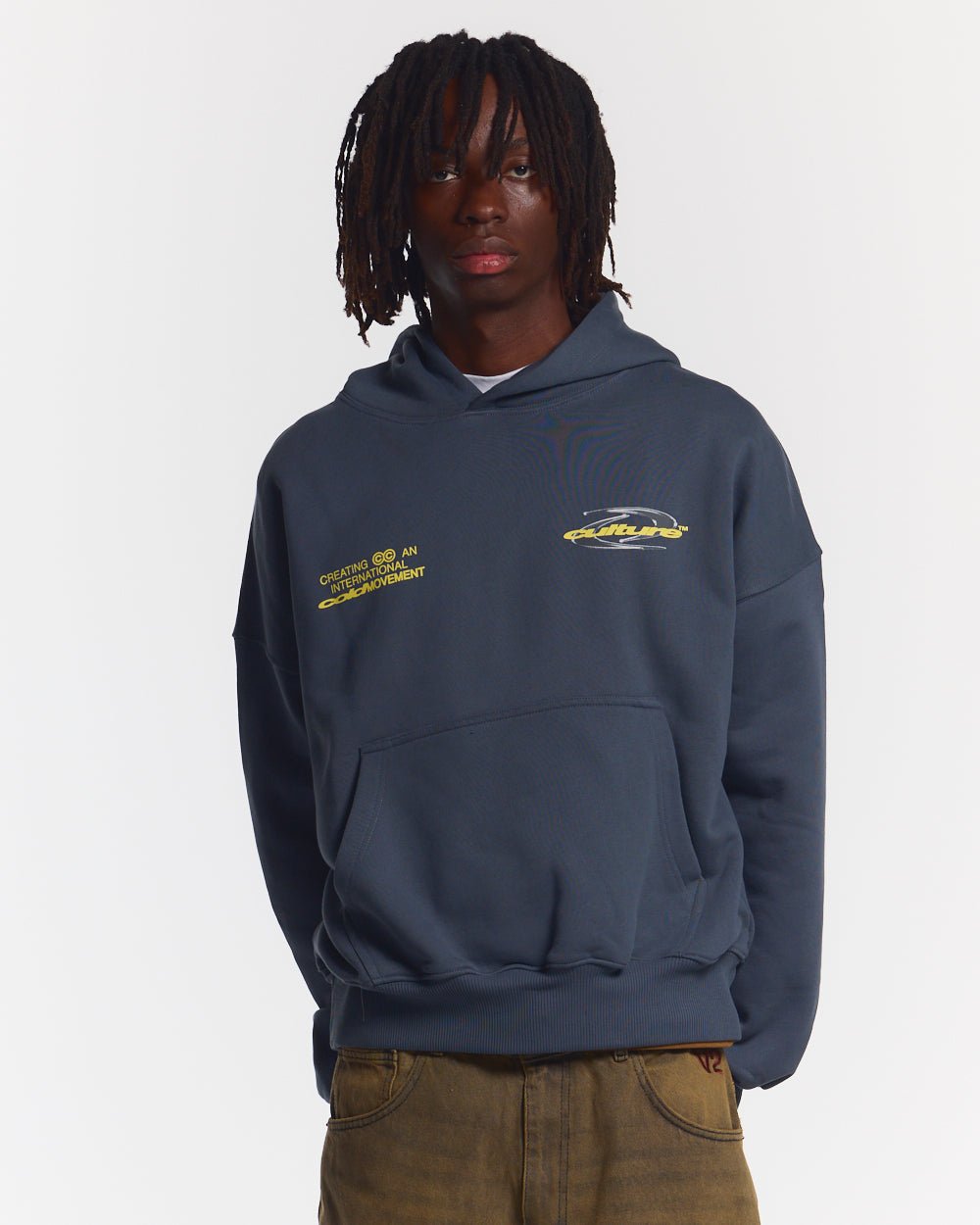 DYNAMIC HOODIE DARK BLUE - dark navy graphic print hoodie, front view on male model - Cold Culture #man