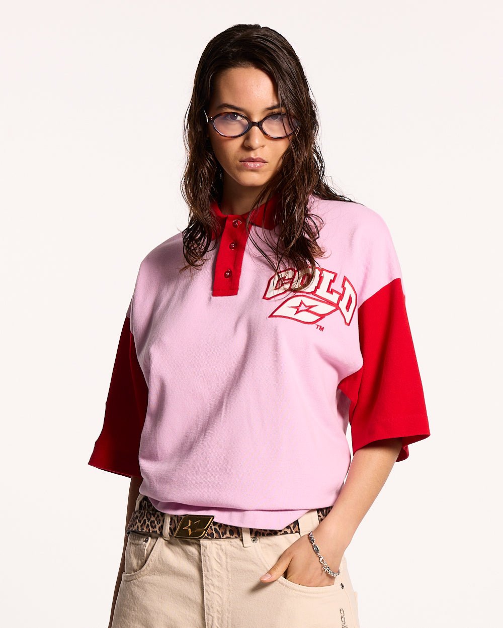 ELLIOT POLO PINK - pink colorblock polo shirt, front view on female model - Cold Culture #woman