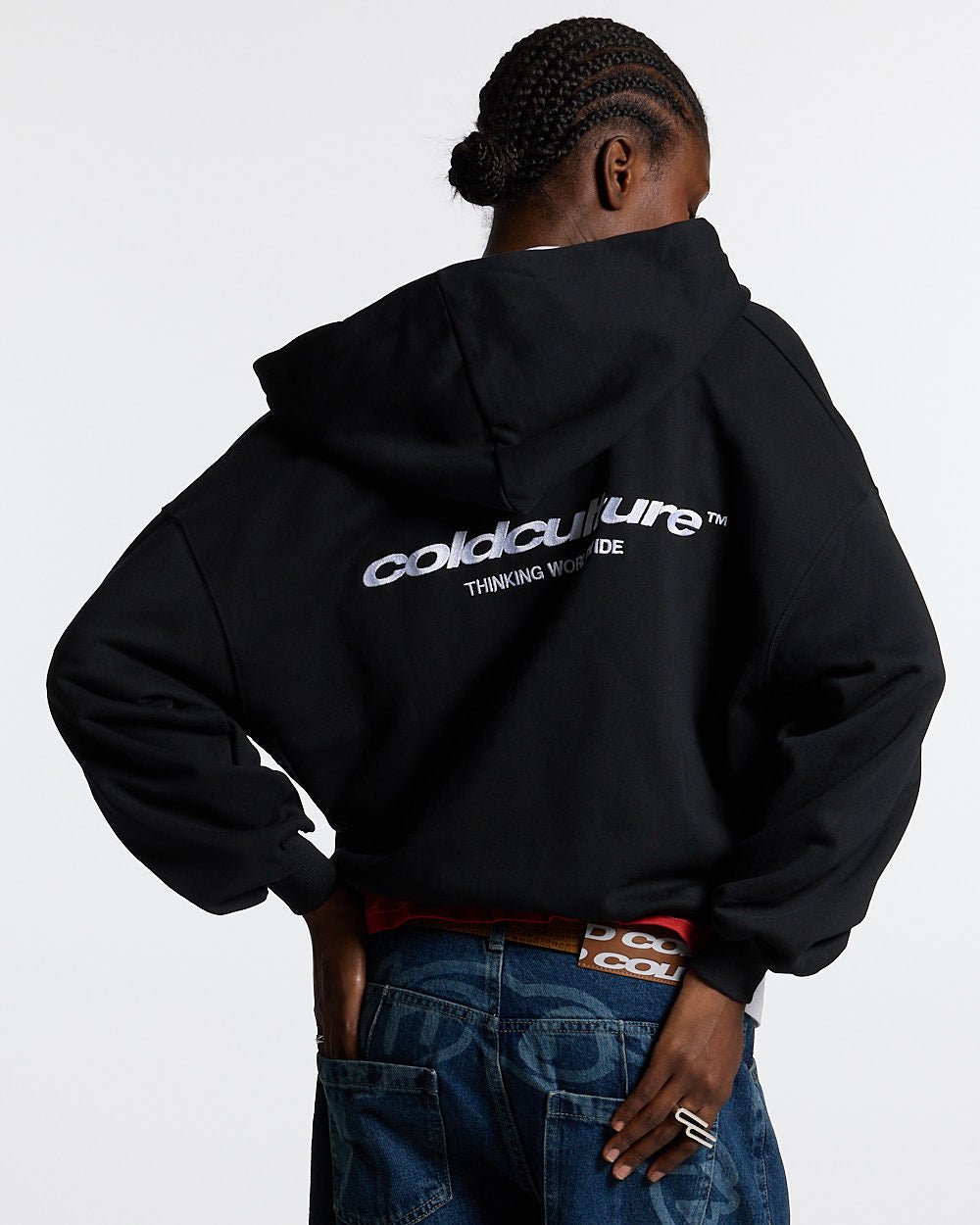 ESSENTIAL ZIP HOODIE BLACK - black zip-up hoodie, back view on female model - Cold Culture #woman