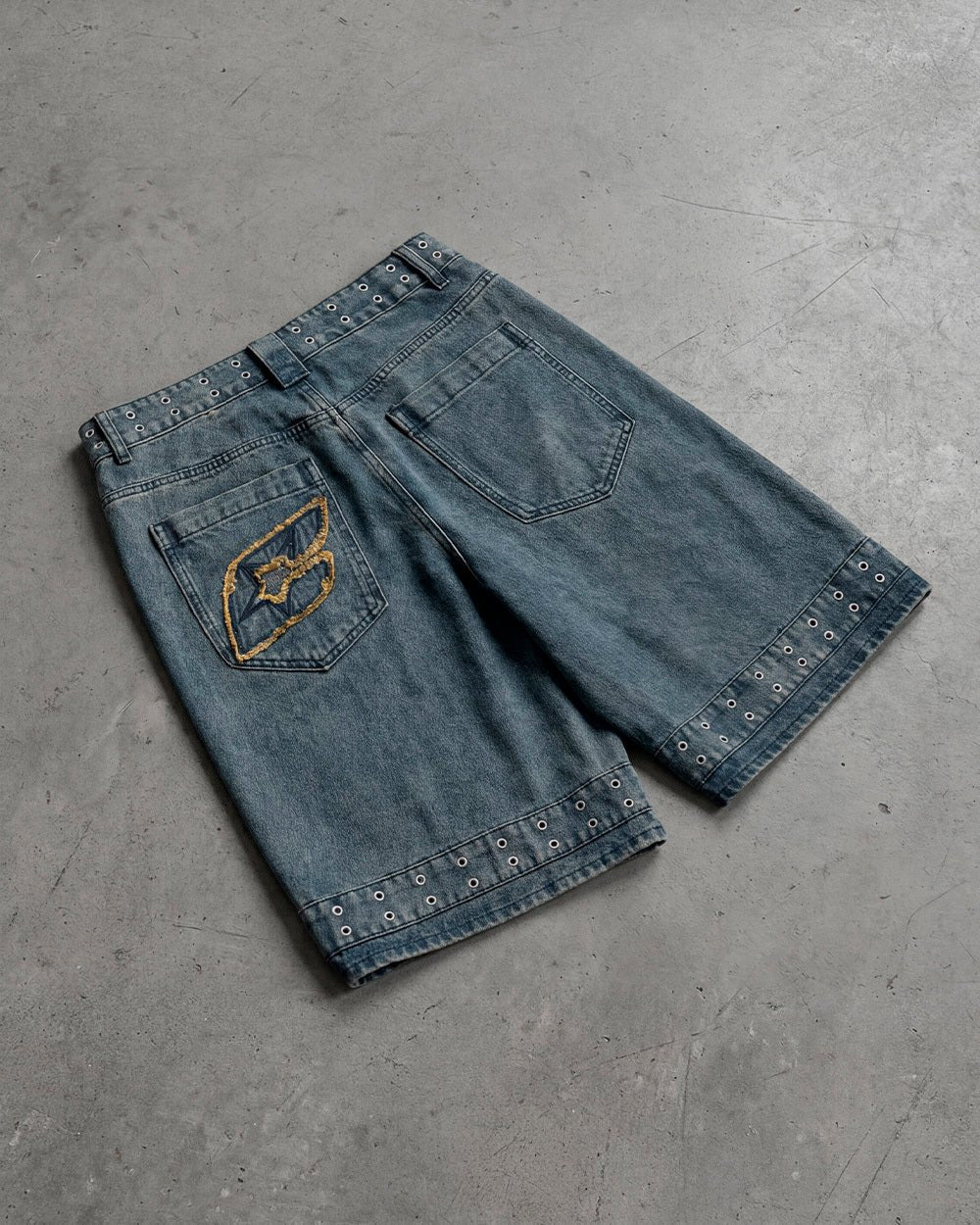 EYELET V2 SHORT DENIM - washed blue denim shorts, flat lay - Cold Culture