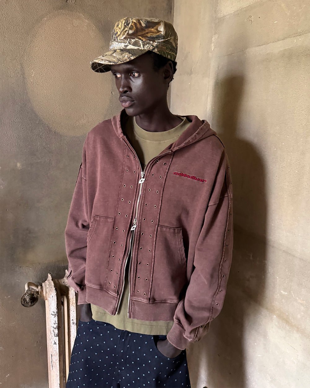 EYELET ZIP HOODIE BROWN - washed brown zip-up hoodie, street style shot - Cold Culture