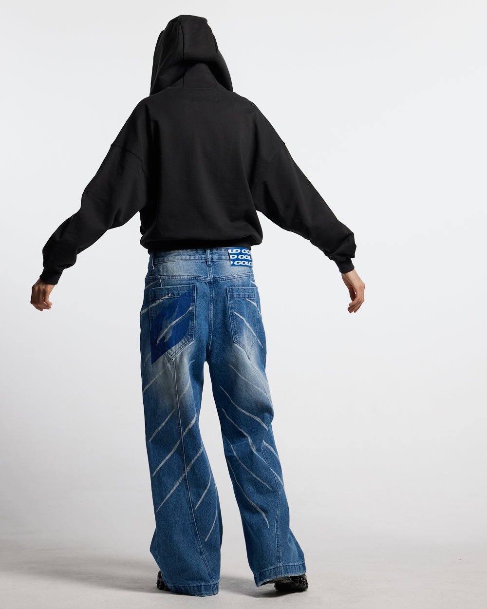 FADED AGE BUZO BLACK & BLUE - black half-zip hoodie, back view on female model - Cold Culture #woman