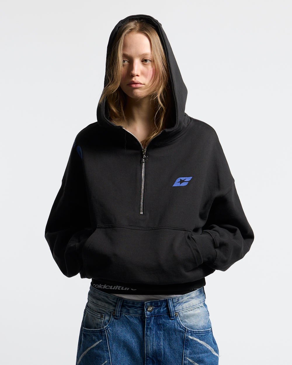 FADED AGE BUZO BLACK & BLUE - black half-zip hoodie, front view on female model - Cold Culture #woman