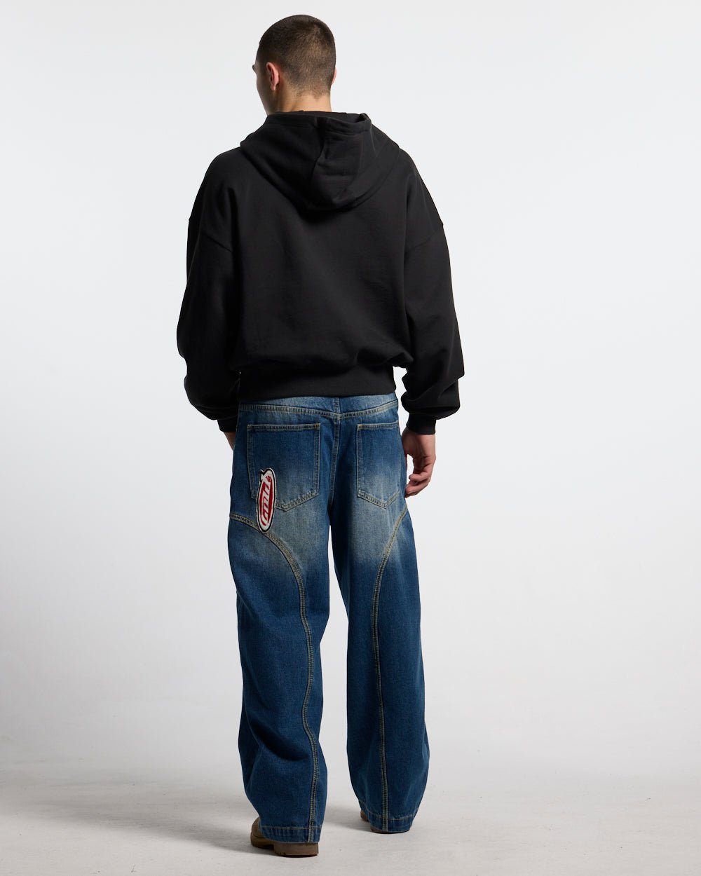FADED AGE BUZO BLACK & BLUE - black half-zip hoodie, back view on male model - Cold Culture