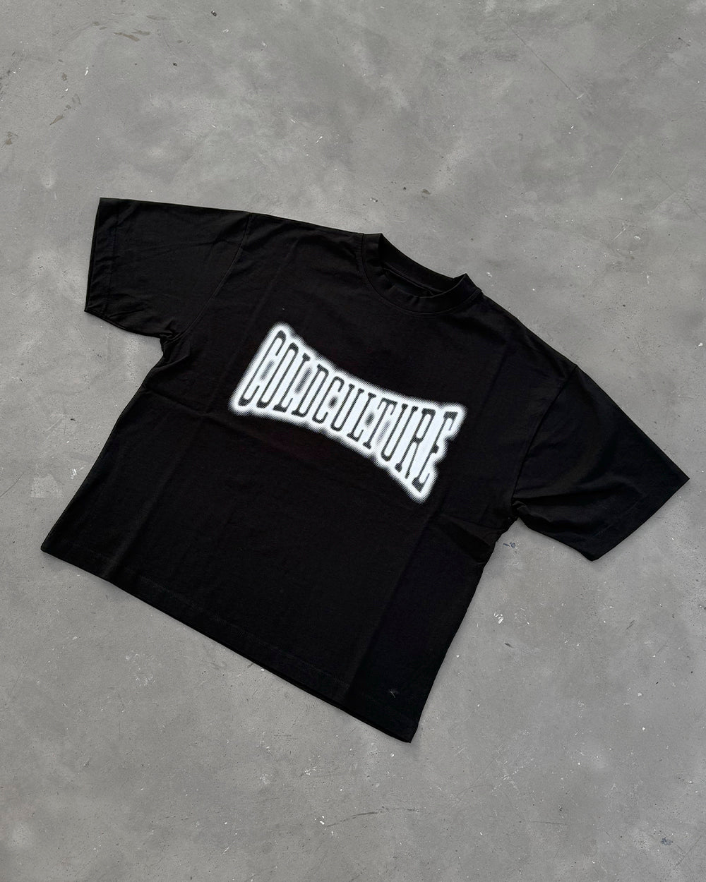 FEISTY TEE BLACK - black graphic print tee, flat lay - Cold Culture