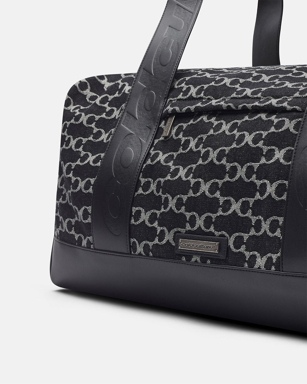 FEVER BAG BLACK - black monogram duffle bag, detail close-up - Cold Culture