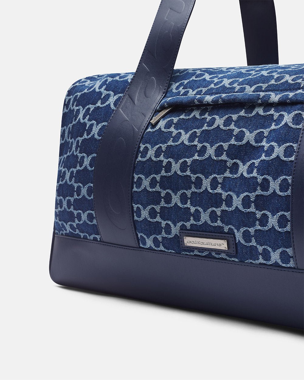 FEVER BAG BLUE - blue monogram duffle bag, detail close-up - Cold Culture