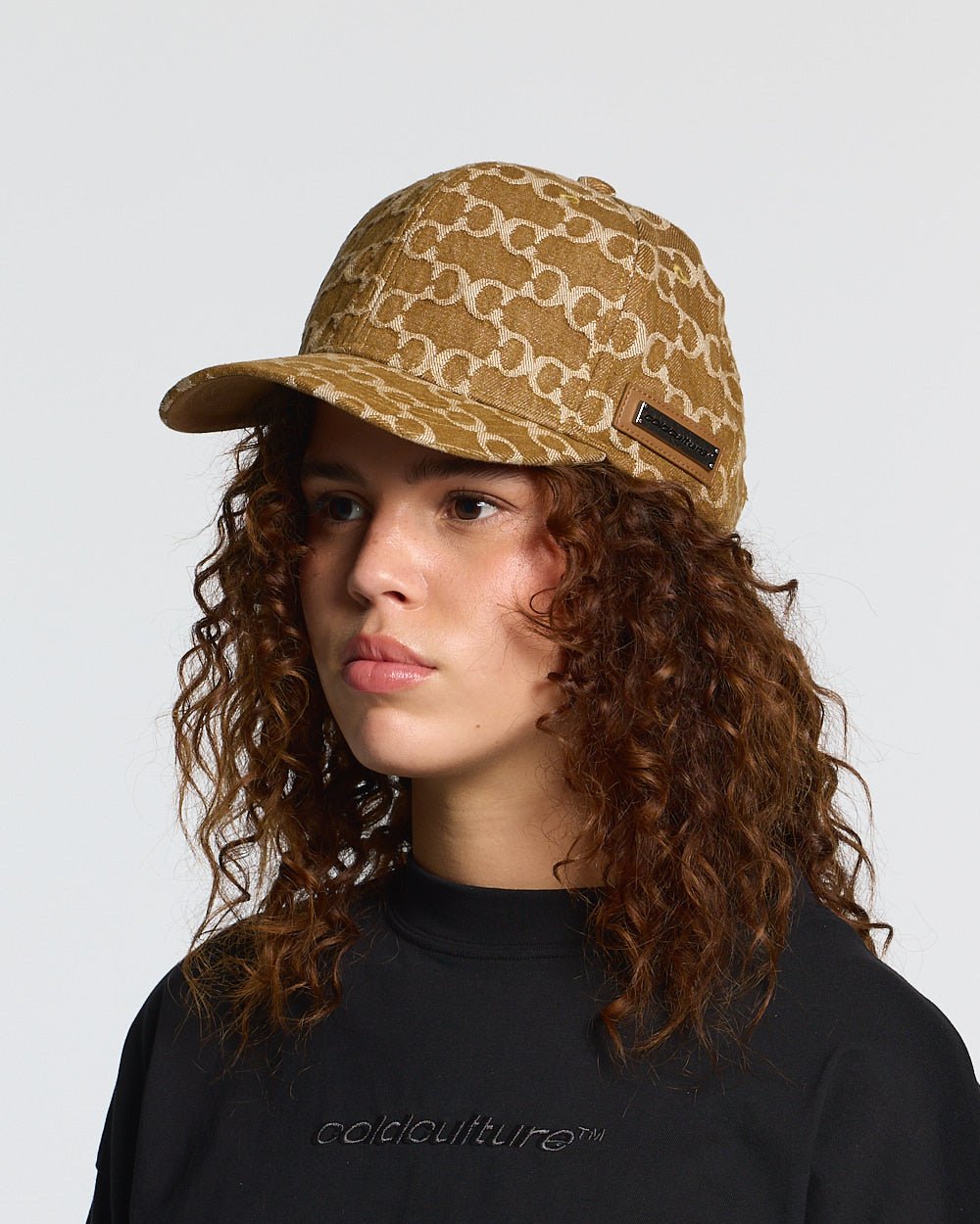 FEVER CAP BROWN - brown monogram cap, on model close-up - Cold Culture #woman