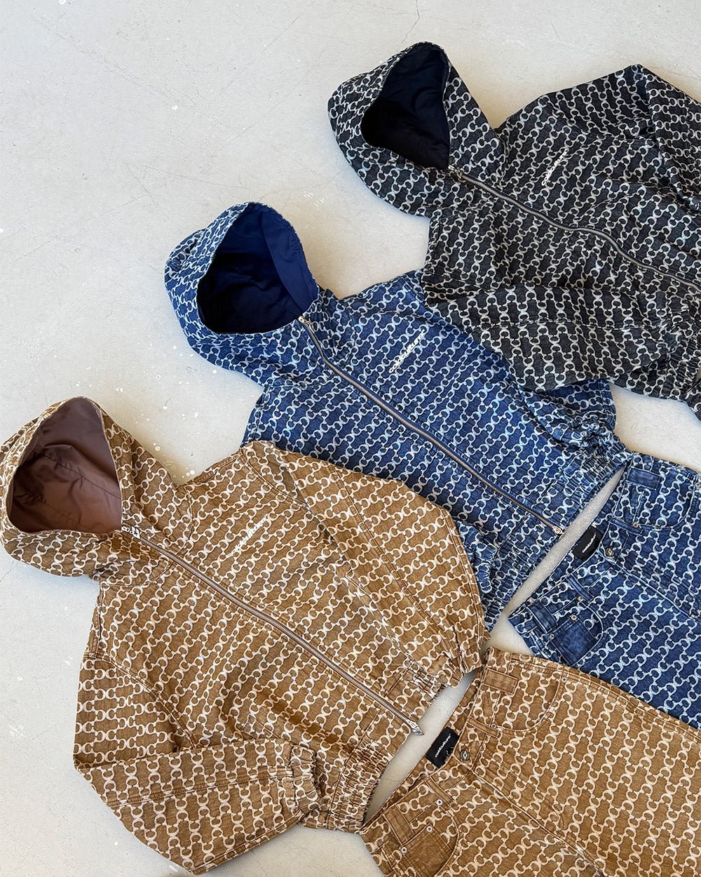 FEVER JACKET BROWN - brown monogram hooded jacket, flat lay with matching pieces - Cold Culture
