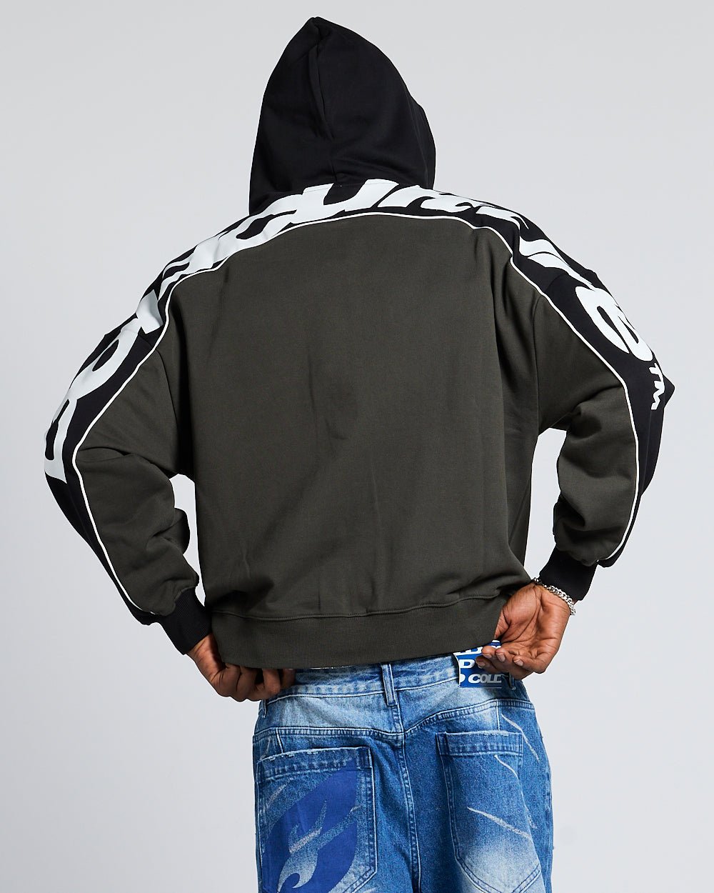 FLESH ZIP HOODIE BLACK & GREY - black and grey zip-up hoodie, back view on male model - Cold Culture