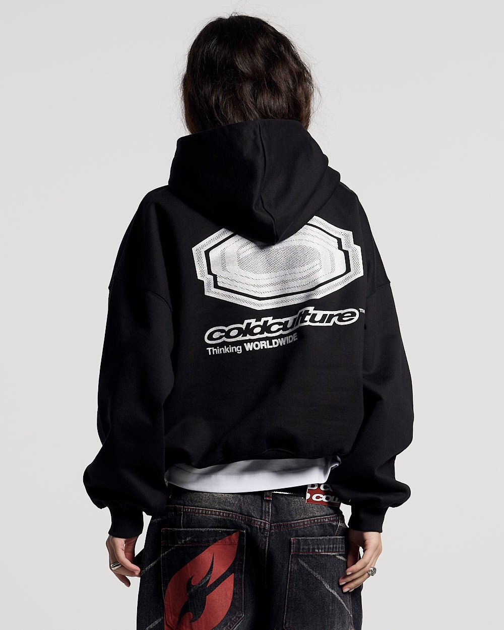 GLITTER HOODIE BLACK - black graphic print hoodie, back view on female model - Cold Culture #woman