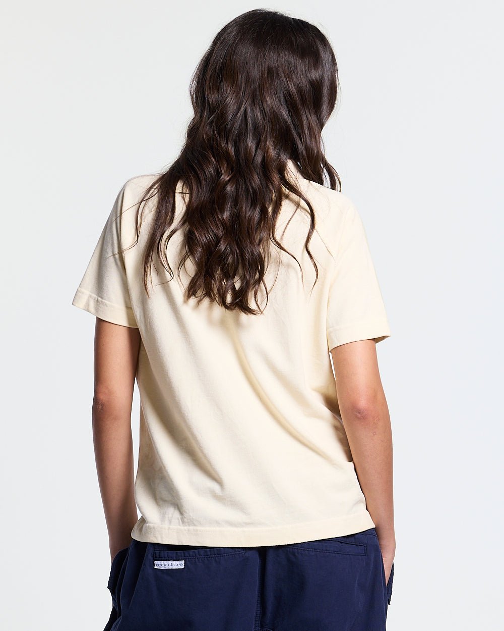 GOTHIC DISTRESSED POLO BEIGE - beige gothic print polo shirt, back view on female model - Cold Culture #woman